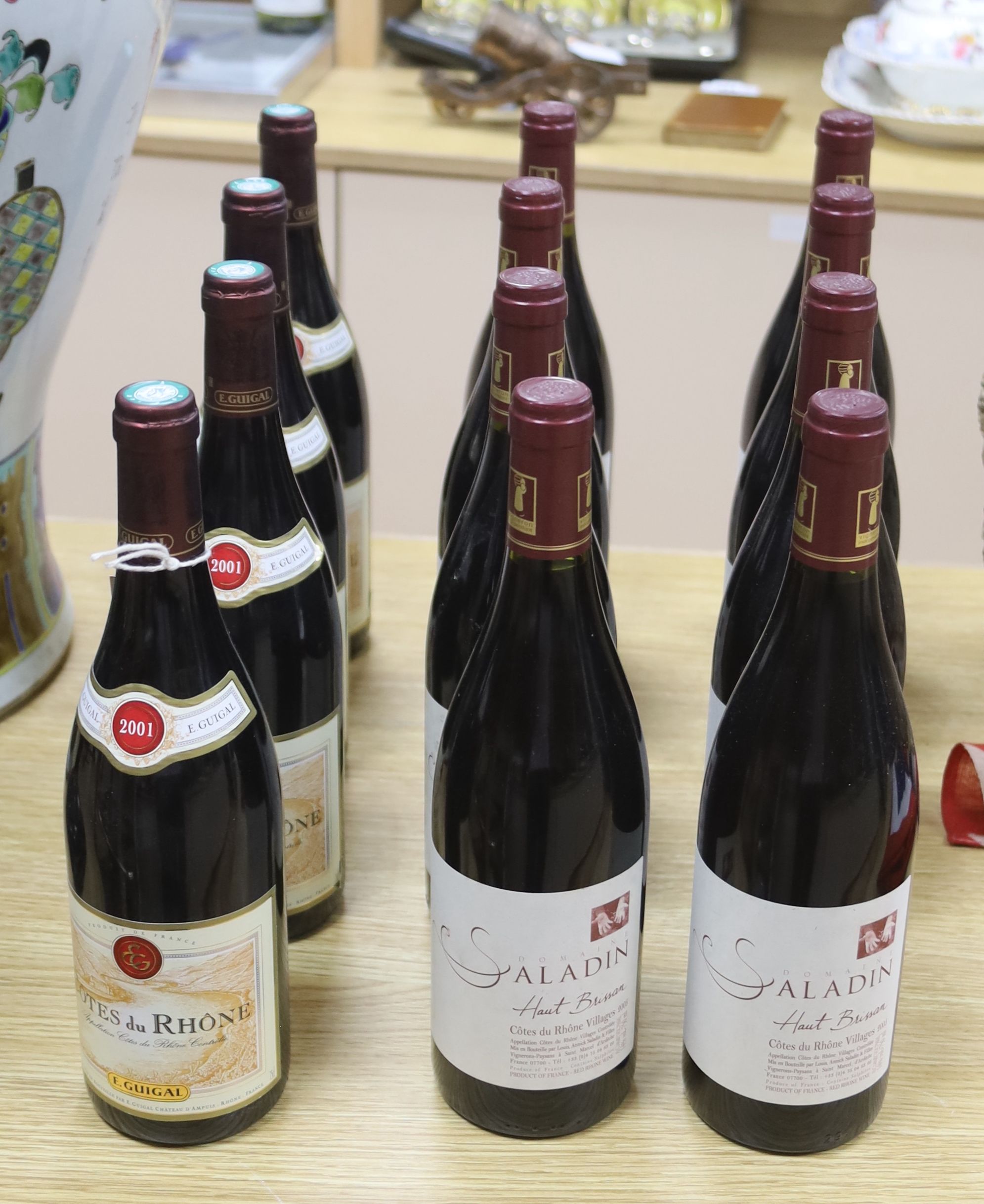 Four bottles of E. Guigal Cotes du Rhone, 2001, 75cl and eight bottles of Domaine Saladin Cotes du Rhone Villages Haut Brisson 14%